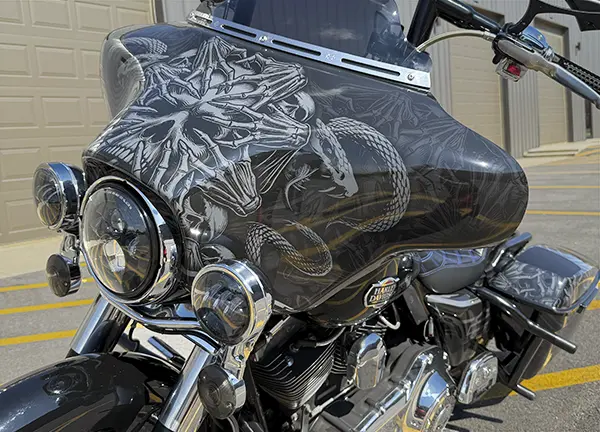 Motorcycle vehicle wrap with custom wrap design.