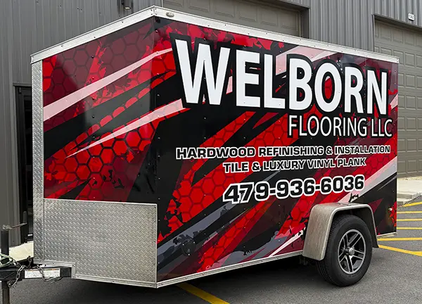 Trailer with full vehicle wrap graphics wrapping the entire trailer.