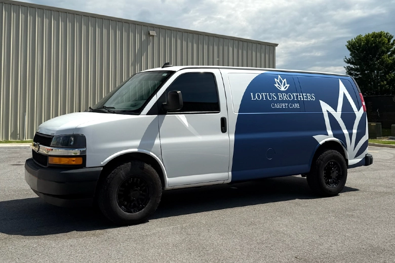 Satin blue wrap with white company logo overlays.