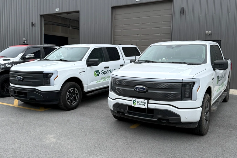 F150 Electric trucks with logo branding on sides.